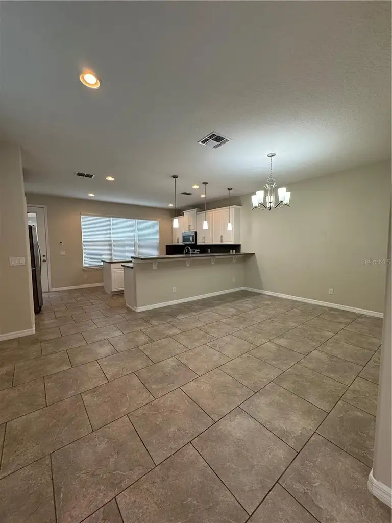 8692 WELLINGTON BLUE LN — photo 2