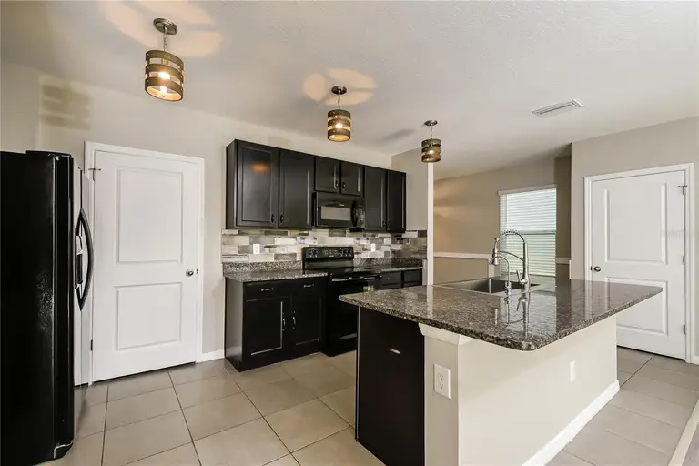 4106 WILLOW HAMMOCK DR — photo 3
