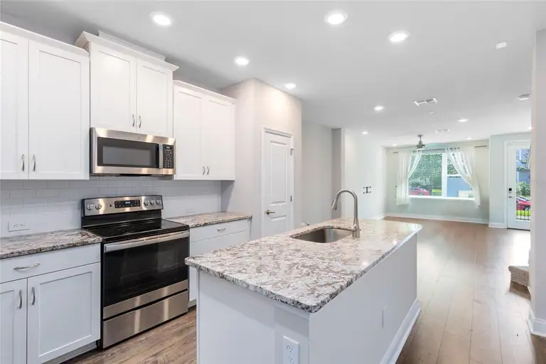 8673 TAVISTOCK LAKES BLVD — photo 2